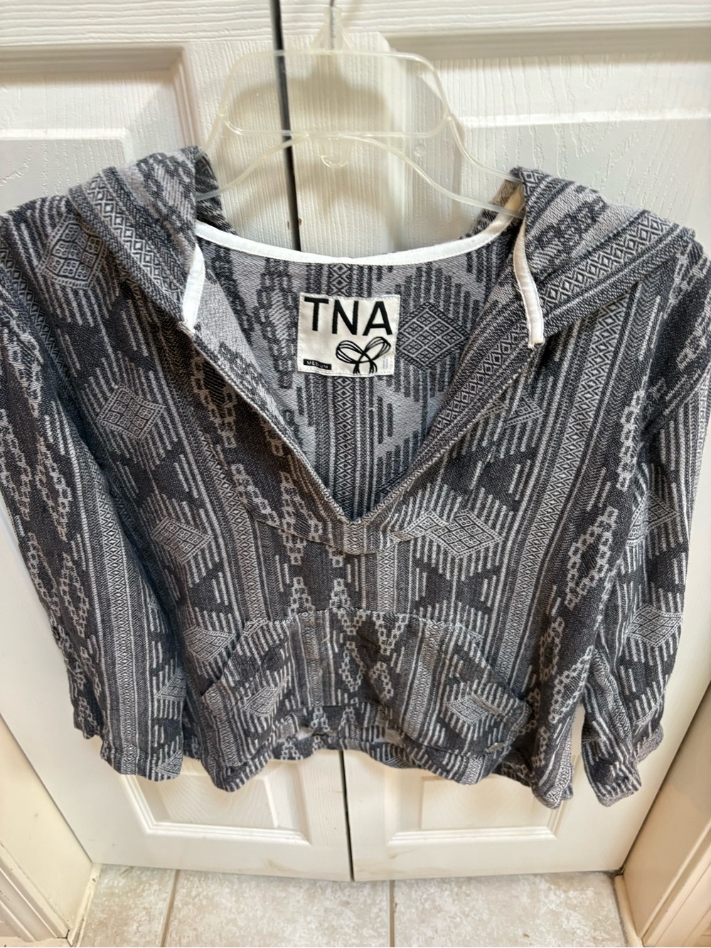 TNA Black and Gray Geometric Hooded Top